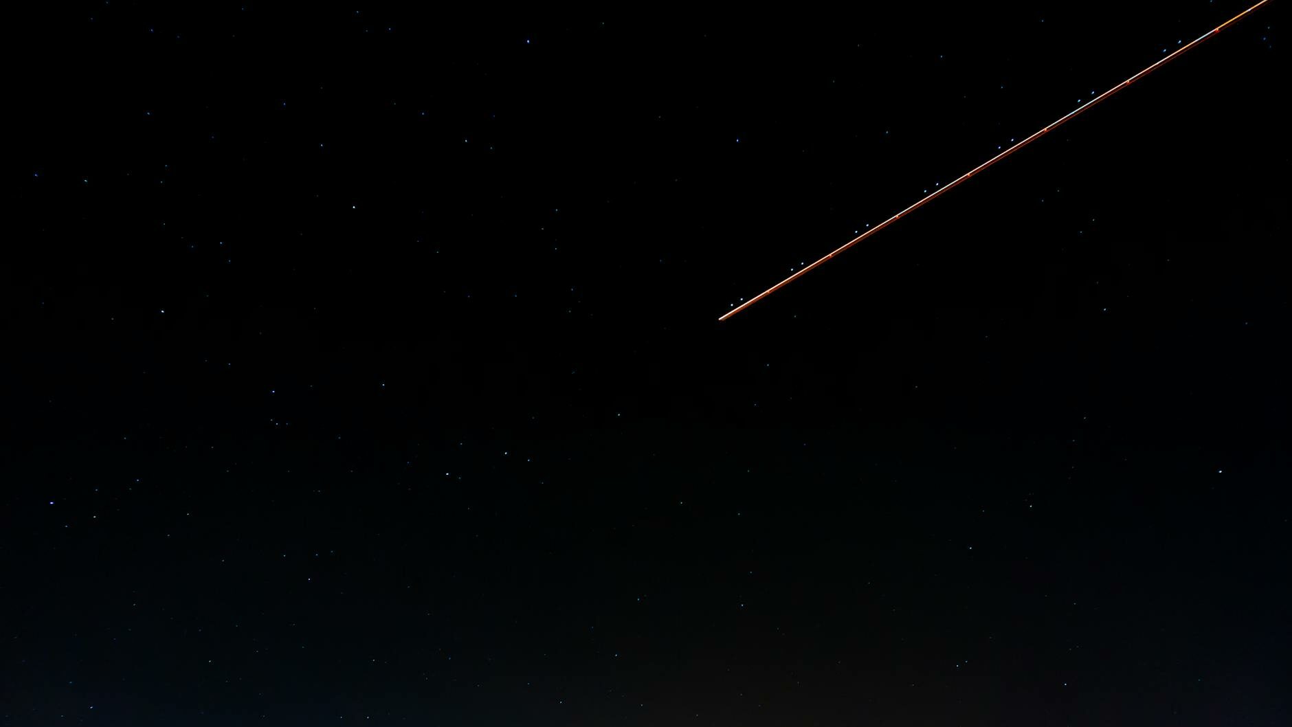 photo of shooting star during night time